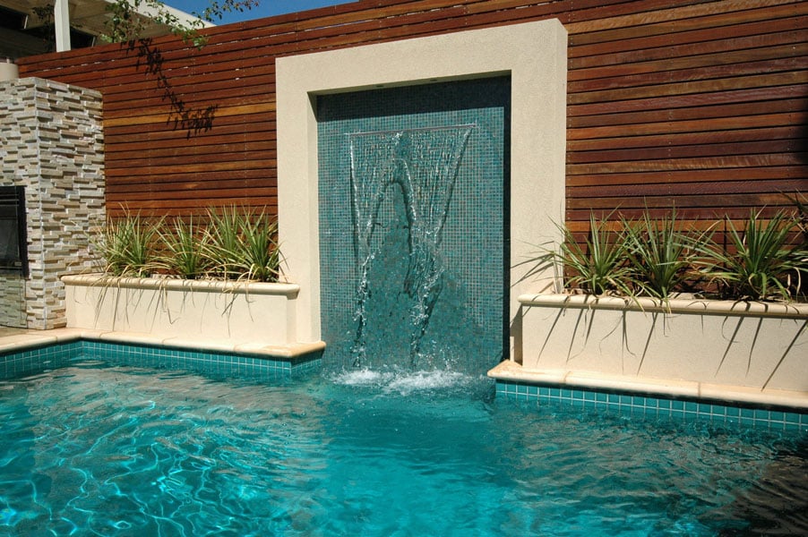 A pool feature fountain with aqua feature tiles - Outdoor Tiles Bundaberg, QLD