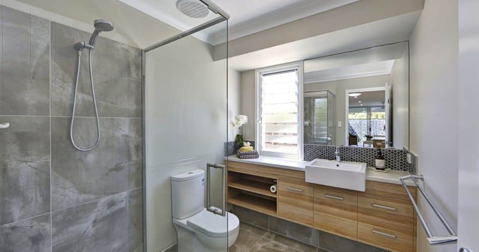 A bathroom ensuite with grey wall tiles - Tiles Bundaberg, QLD