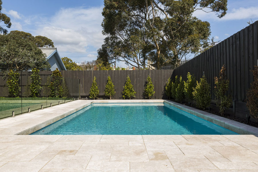 Mosaic tiles around a pool in a backyard - outdoor tiles Bundaberg, QLD
